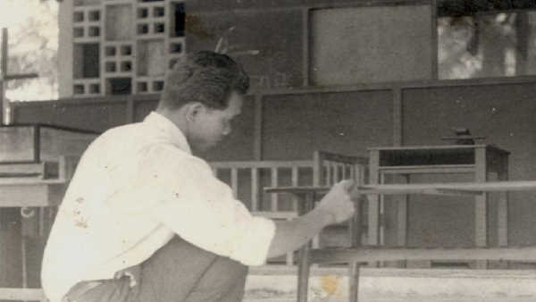 Hamid Tukang Kayu Rengit 1960s Working on Table